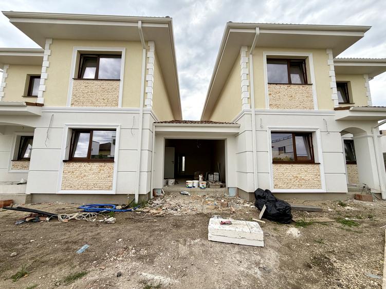Duplex nou despartit prin garaj, 4 camere, 108 mp utili - Dumbravita