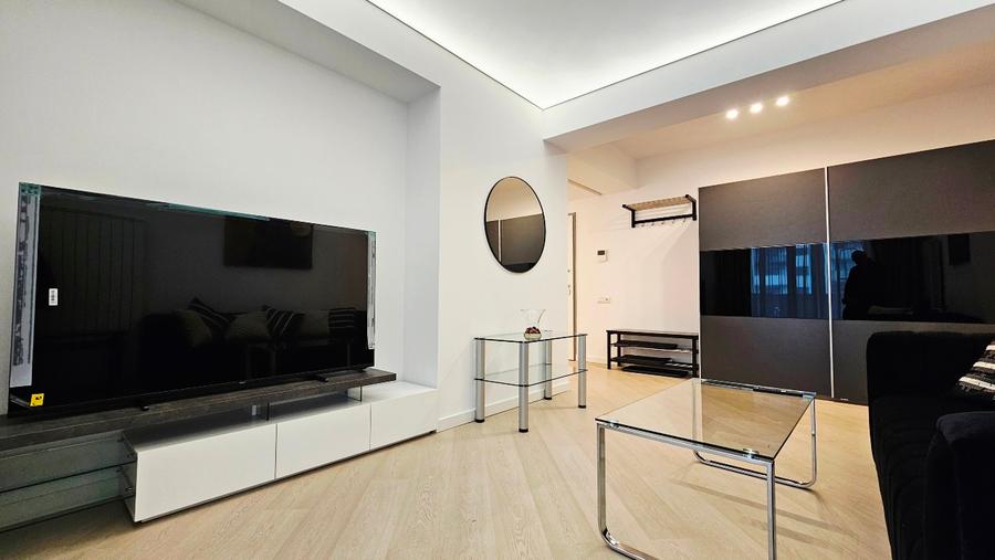 Ofer spre închiriere apartament 2 camere decomandat plus loc parcare subteran