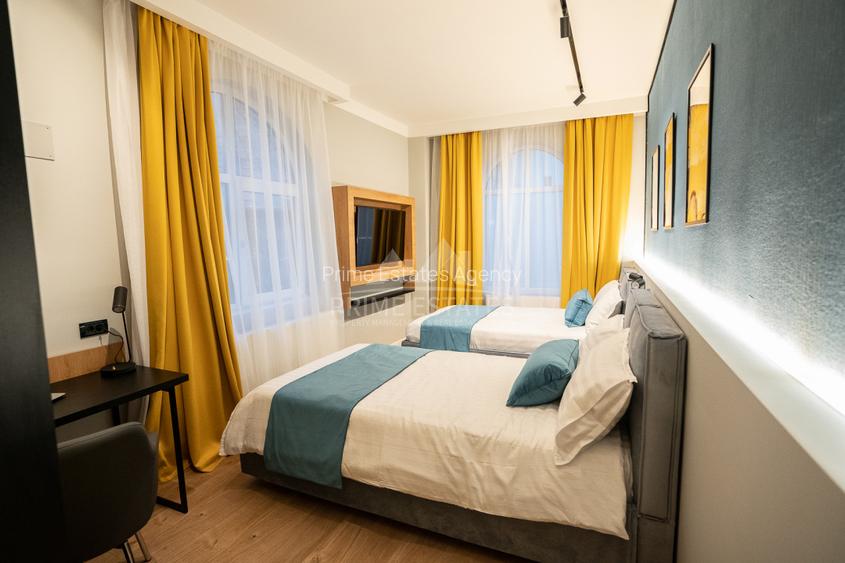 DE ÎNCHIRIAT Cladire Boutique, 12 Unități finisate premium, zona Romană-Eminescu - 34