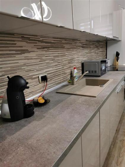 Garsoniera moderna – Coresi, confort & stil