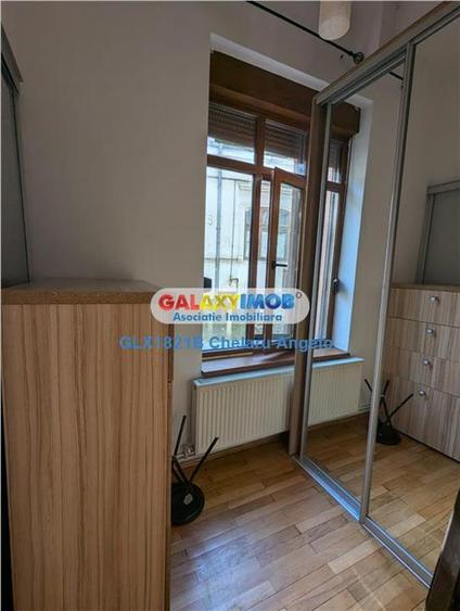 Unirii-Regina Maria,ap 2 camere in vila,parter,supr 35 mp+pivnita 20mp