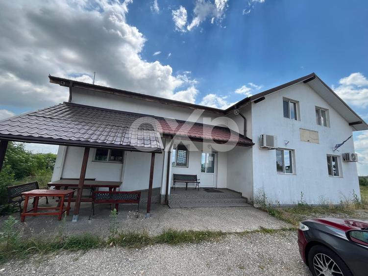 Casă P+M cu birouri amenajate și teren 5.423 mp pentru firmă și locuit acces A1