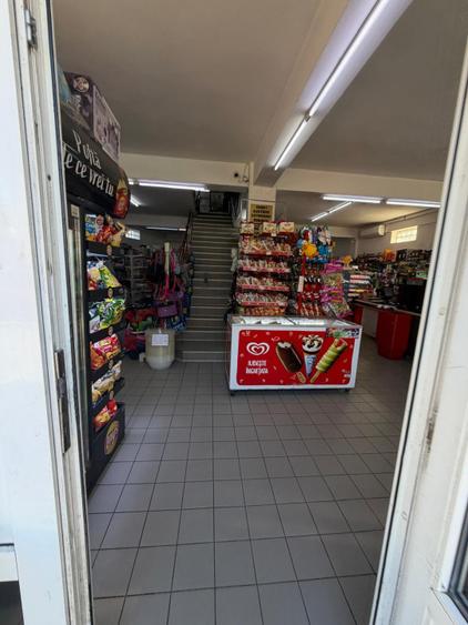 Spatiu comercial , 1300 mp pe 4 nivele, in centrul orasului Filiasi