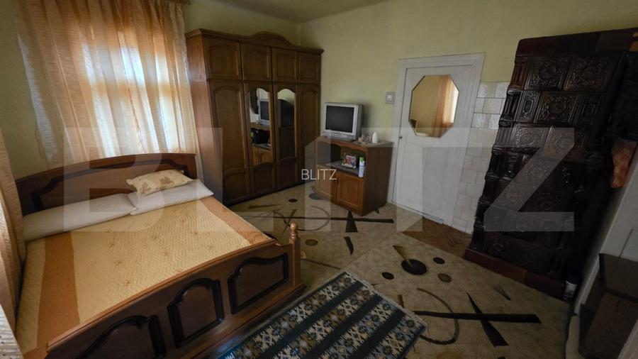 Două case de vânzare, curte comună, 4 camer 110mp, 50 ari Cristeștii Ciceului