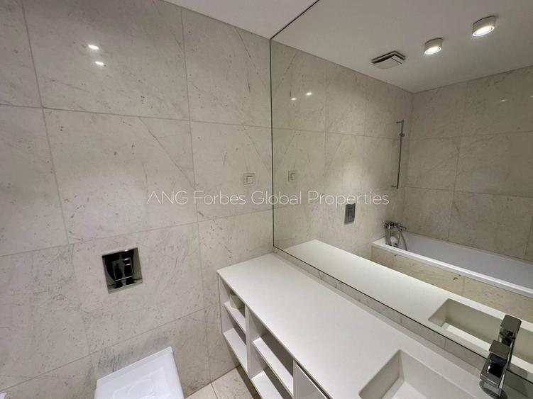 Duplex de lux cu terasă spectaculoasă, în inima zonei Charles de Gaulle