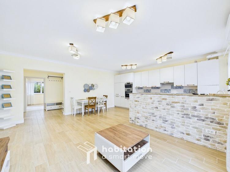Apartament spațios cu curte și garaj – confortul unei case moderne