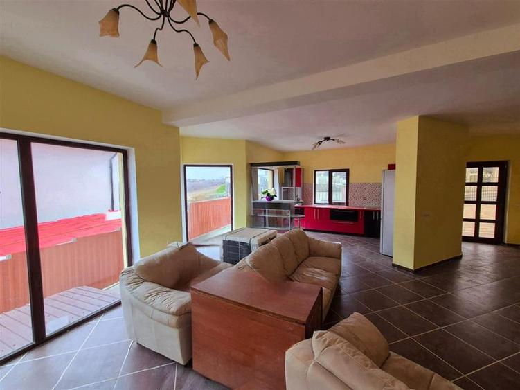 Casa de vanzare individuala cu garaj in Bucium