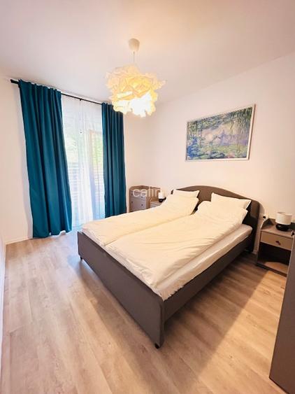 Închiriez apartament 2 camere, cu gradina amenajată in bloc nou.