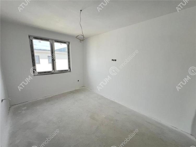 Casa cu 4 camere 2 bai curte de 50 mp zona Calea Cisnadiei Sibiu