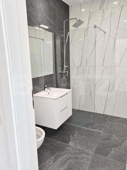 Apartament spațios cu 3 camere și 2 băi, ideal pentru familie