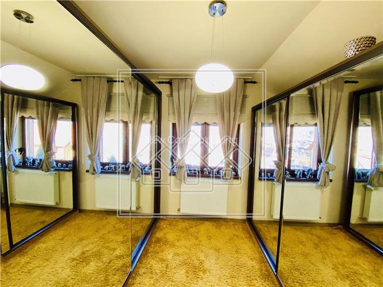 Casa individuala - 197 mp utili, teren 407 mp, 5 camere - Sura Mare - 27