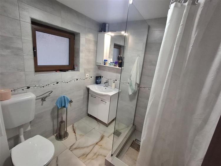 Casa individuala 3 camere 2 bai curte si garaj - zona Talmaciu