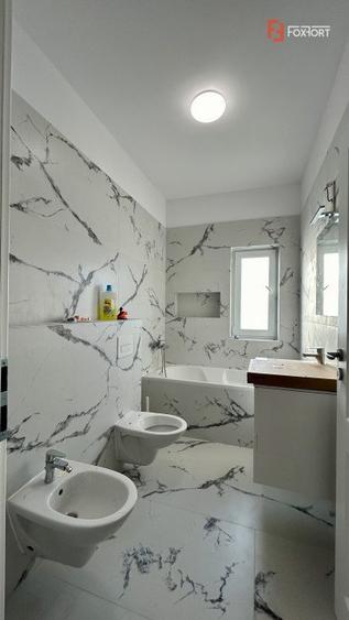 Duplex cu 4 camere si teren de 375 mp - zona Sanandrei