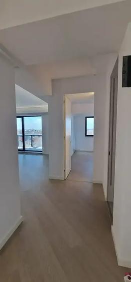 Apartament 3 camere premium în Cortina North | Etaj 5 | Balcon | Vedere panorami