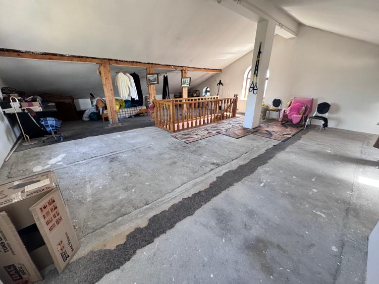 Casa individuala P+1+M amplasata pe un teren de 1612 mp.