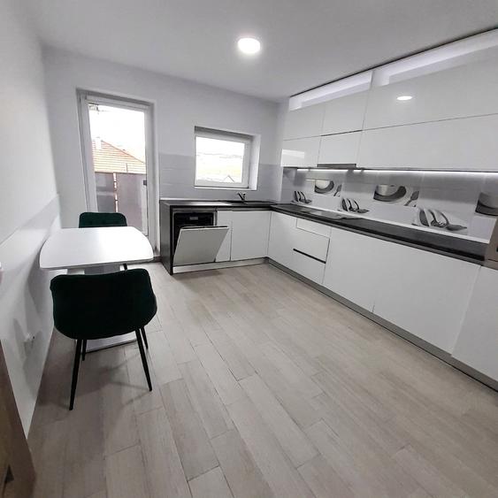 Casă P+E, 192 mp utili, teren 600 mp și garaj dublu | Dezmir