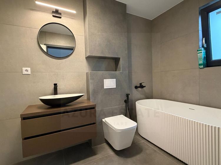 Apartament premium vila tip boutique 4 camere 4 bai si curte 200 mp