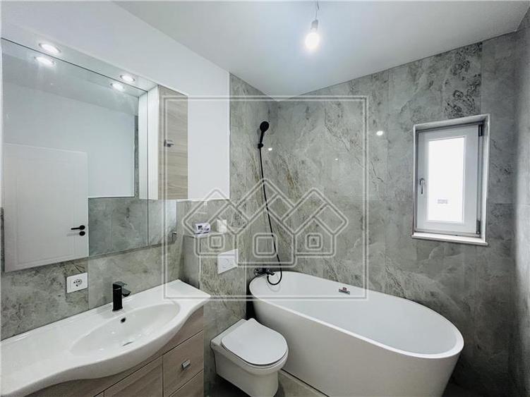 Casa noua de vanzare, 4 camere, 2 bai, terasa 21 mp, zona linistita