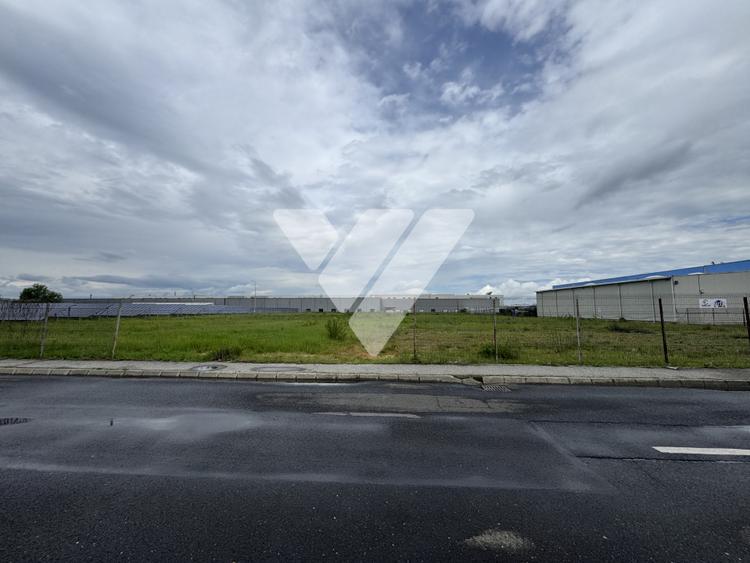 Teren intravilan industrial 11.059 mp, PUZ aprobat, asfalt - zona Vest