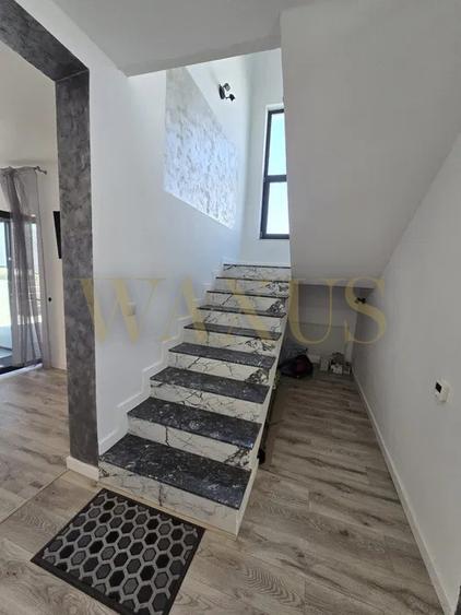 Casă finisată cu 120 mp utili și 497 mp teren Dezmir