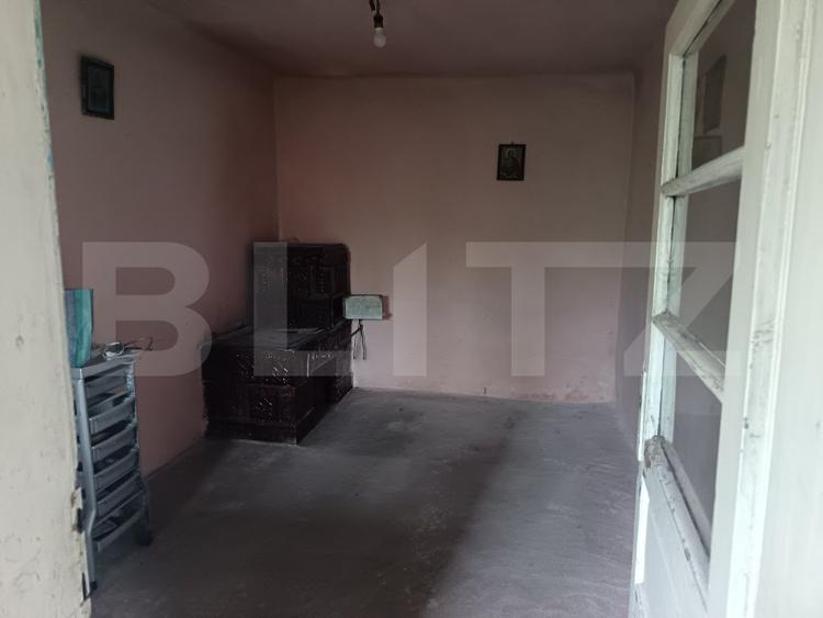Casa renovabila,  cu un teren 2000 m,  intr-o zona linistita!