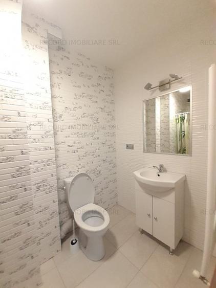 Apartament 3 camere,2 bai,et.1,balcon,parcare subterana! zona Marasti