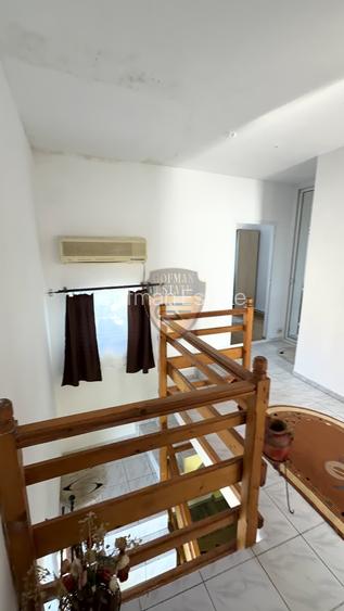 Casă cu teren generos de 1.400 mp – Palazu Mare,