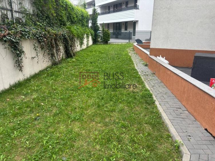 Apartament cu grădină generoasă și parcare