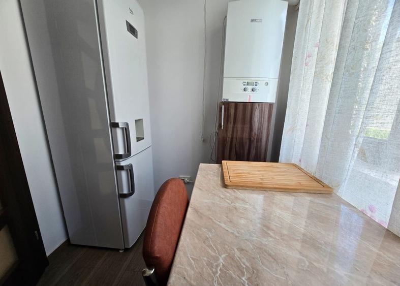 Apartament de 2 camere, 62 mp, centrala, aer condiționat, zona Ștefan cel Mare