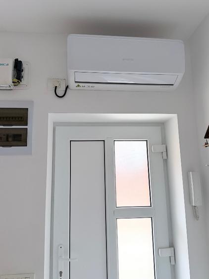 Apartament la curte cu loc de parcare