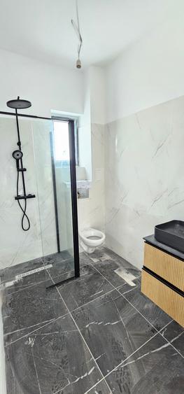 Casa 4 amere,la intrare in comuna