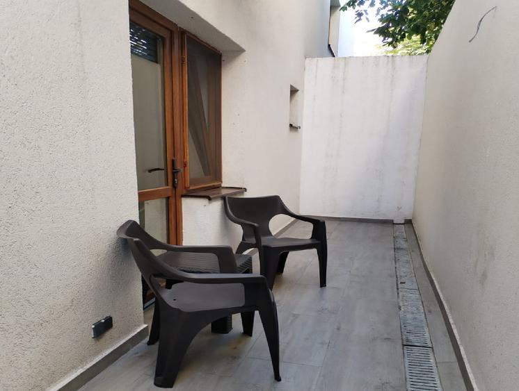 Apartament Studio cu curte proprie - Central