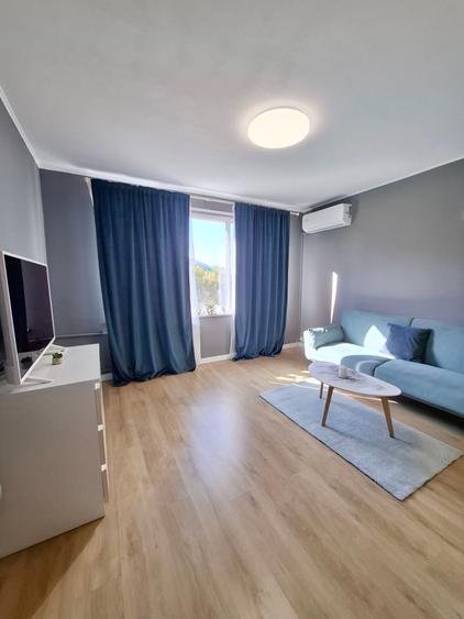 2-room apartment | view Sala Palatului park | subway Piata Romana |