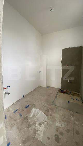 Casa pe calcan cu priveliste deschisa si compartimentare deosebita.