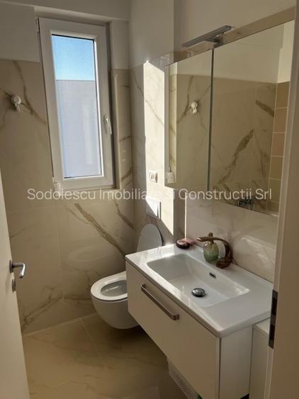 Apartament cu 3 camere, 2 bai si loc de parcare - 25