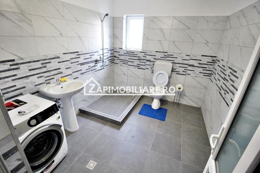 Casa 4 camere,4 bai,1 bucatarie,1 living,120 mp,500mp teren