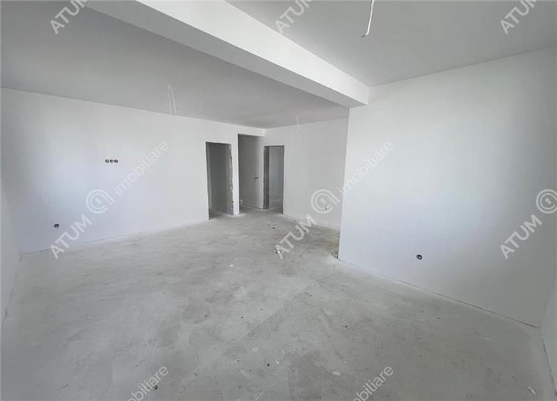 Casa cu 4 camere 2 bai curte de 50 mp zona Calea Cisnadiei Sibiu
