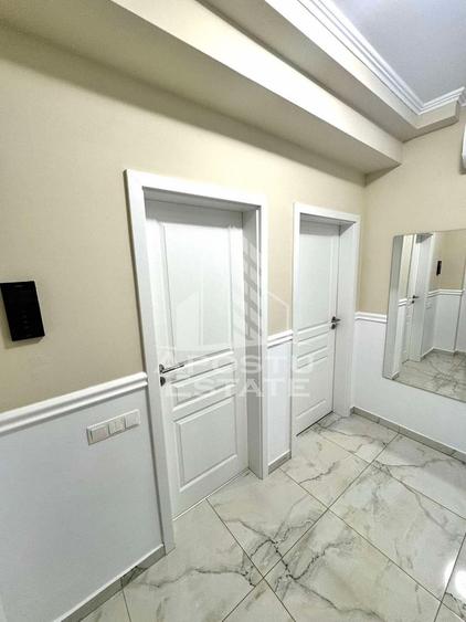 Apartament cu 2 camere,terasa de 38 mp,2 locuri de parcare,Dumbravita