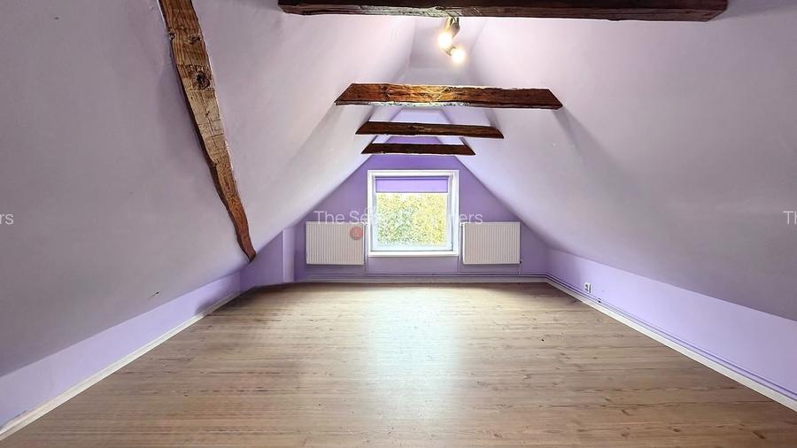 Casa saseasca traditionala La asfalt Curte generoasa