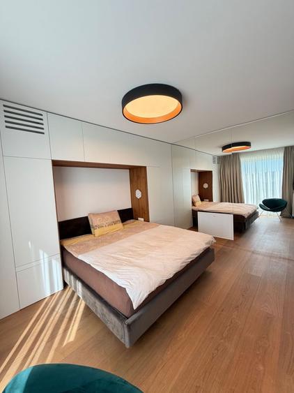 Apartament PREMIUM cu curte, terasă și lift cu acces direct în living
