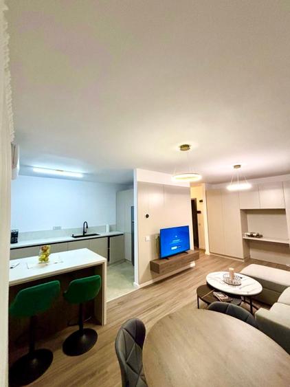 Inchiriez ap. 2 camere, complex ELITE,58 mp cu garaj, nou!