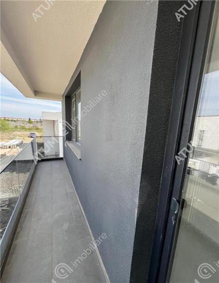 Casa cu 4 camere 2 bai curte de 50 mp zona Calea Cisnadiei Sibiu