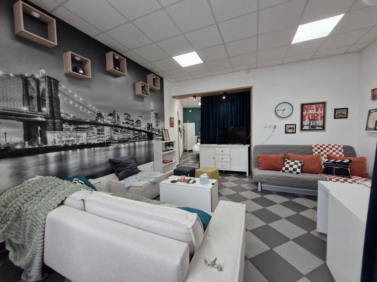 Imobil Multifuncțional – Spații Comerciale și Apartamente