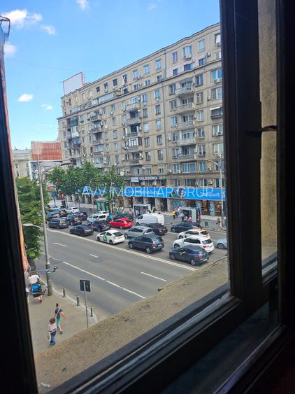 Bulevardul Magheru, Piața Romană - 11
