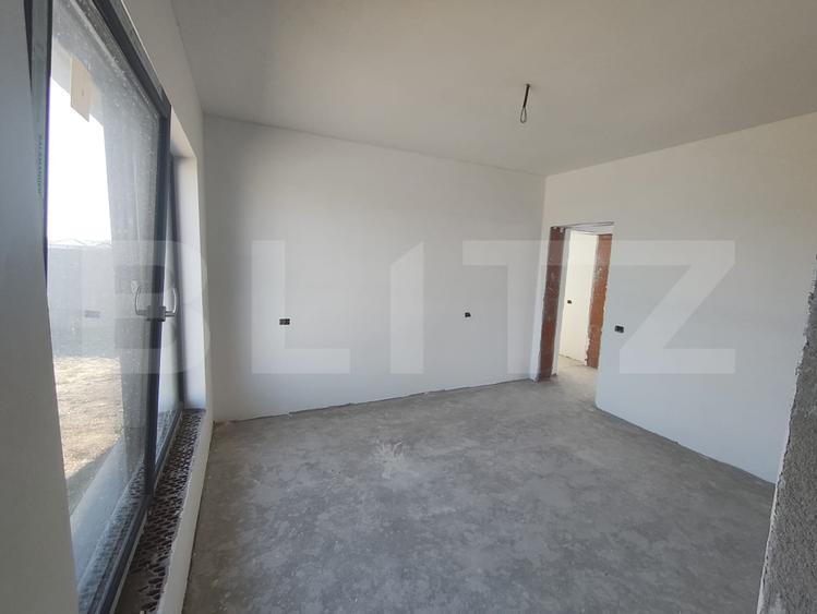 Casa noua in Santandrei , racordata la toate utilitatile si gard imprejmuitor