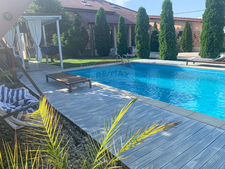 Casa de vanzare P+M Premium, piscina, teren 2224mp Bacu, Ilfov