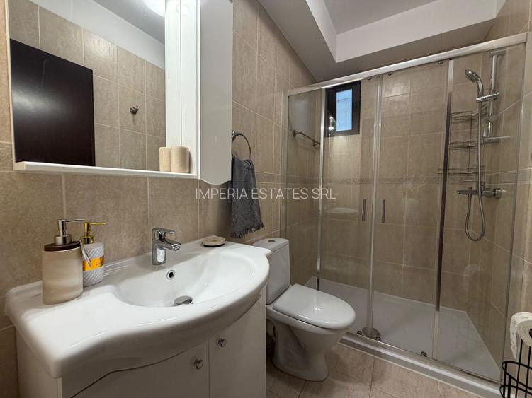 Vila cocheta cu spatii generoase si gradina de 350 mp - 9