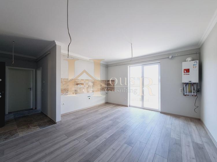 BLOC FINALIZAT TIP VILA. STRADA ASFALTATA. GRADINA PRIVATA.
