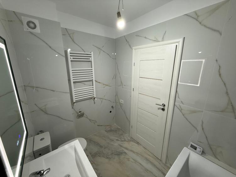 Apartament 2 camere tip studio + parcare