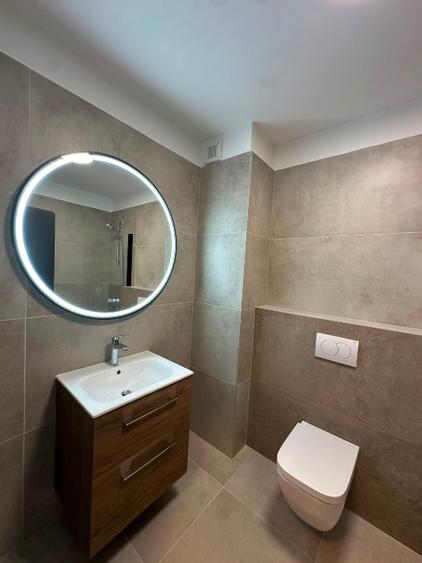 Inchiriez apartament central. Parcare subterana inclusa